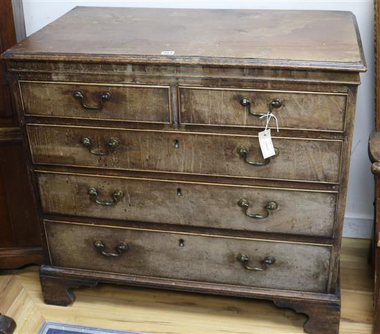 A George III mahogany chest fitted two short drawers and three graduated long drawers, on bracket feet W.92cm